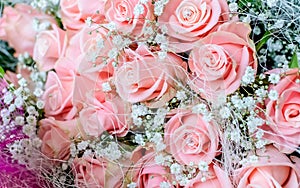 Bouquet of pink roses with small briliants