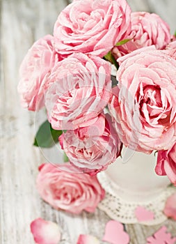 Bouquet of pink roses in a vase close-up