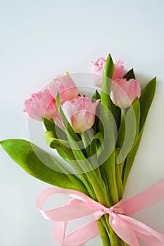 A bouquet of pink tulips. beautiful spring flowers. background for decoration for the Easter holiday.