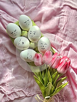 Bouquet of pink tulips and Easter eggs