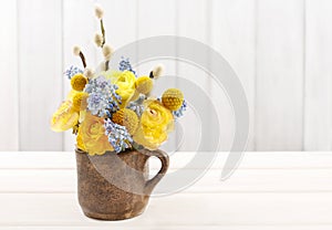 Bouquet of ranunculus (Persian buttercup) and muscari (Grape hya