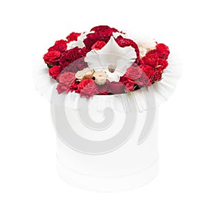 Bouquet of red flowers in the box isolated on white background