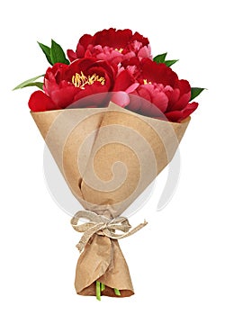 Bouquet of red peony flowers in a craft paper cornet isolated on white