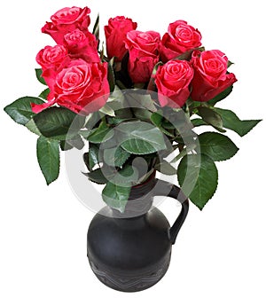 Bouquet of red roses in black ceramic jug