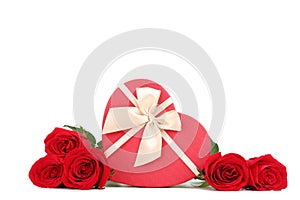 Red roses with heart shaped gift box
