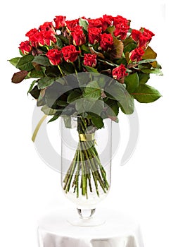 Bouquet of red roses over white