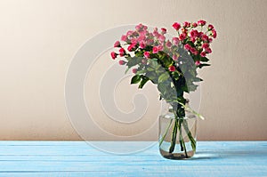 Bouquet of red roses in a pot