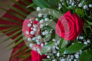 Bouquet of red roses . Red flower picture close up in the bouquet. The flower`s petal . Bouquet of fresh red roses