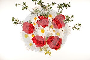 Bouquet of red roses and white daisies on a white background