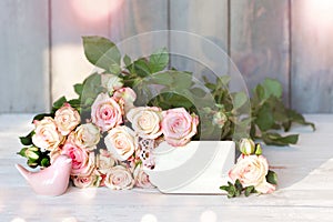 Bouquet of roses with a card for a message