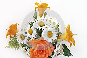 Bouquet of roses, chamomiles and daylilies. Flowers in a bouquet of country style on a white background.