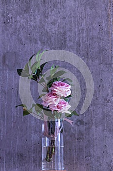 Bouquet of roses in a glass vase.