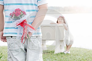 Bouquet Roses in hand man for little bride