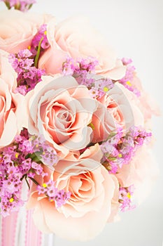 Bouquet of roses and pink statice