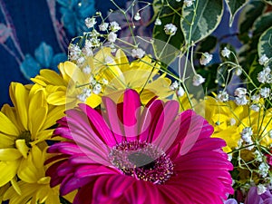 Bouquet of scarlet gerbera and yellow flowers