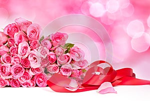 bouquet sweet pink roses petal on sweet pink background , rom