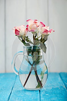 Bouquet of three white and pink roses