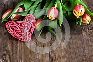 Bouquet of tulips with pink heart