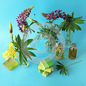 A bouquet of useful herbs and flowers, natural soap, aromatic oil