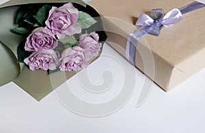 Flower rose pink violet purple gift box ribbon white background