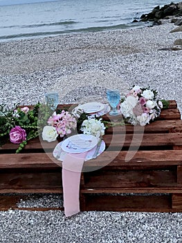 Bouquet wedding flowers and decor in the morning bride on the beach