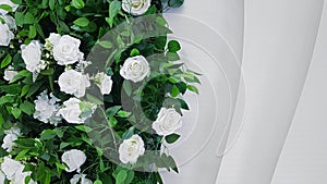 Bouquet of white Dutch roses combined with other flowers with copy space. Festive wed background