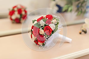 Bouquet from white and red roses