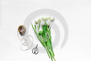 Bouquet of white tulips and accessories