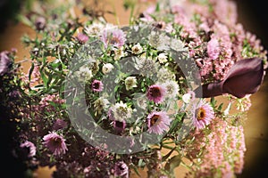 Bouquet of wild flowers on a dark background