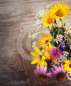 Bouquet of wild flowers vintage board