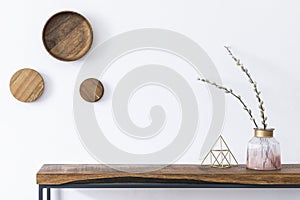 Bouquet on the wooden console table.