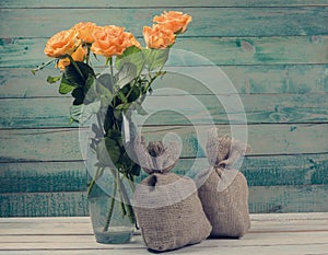 Bouquet of yellow roses in glass vase