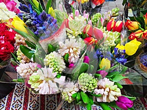 Bouquets of flowers packed in cellophane