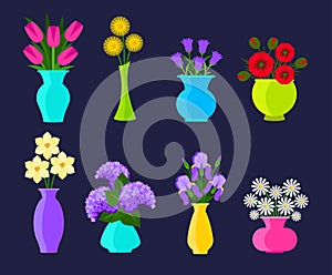 Bouquets of flowers in vases in flat style. Summer and spring flowers set. Vector flowers illustration