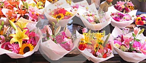 Bouquets of fresh cut flowers at an outdoor market