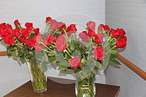 Bouquets of red roses on the table