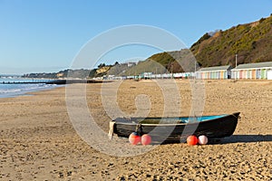 Bournemouth beach Dorset England UK with boat sea and blue sky