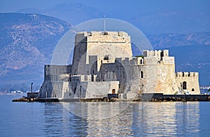 Bourtzi Venetian water fortress in Nafplio, Greece photo