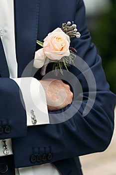 Boutonniere on the lapel of the groom