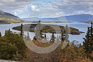 Bove island on the windy arm of the Tagish lake near the Klondike Highway in Yukon.