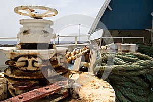 Bow with anchor chain and hawser photo