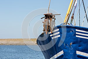 Bow with anchor shrimp fishing ship in Dutch harbor Lauwersoog