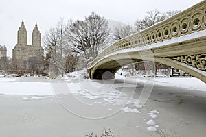 Bow Bridge, Central Park after snowstorm, New York photo