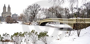Bow bridge with snow fall