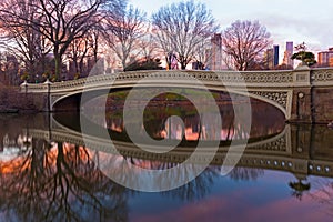 Bow Bridge at sunrise in Central Park, New York.