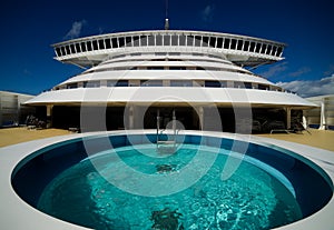 The Bow of cruise ship with pool and captain`s bridge