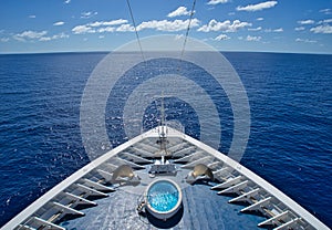 The bow of a cruise ship sailing in the Pacific Ocean.