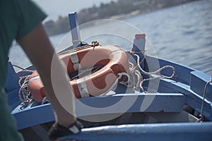 Bow detail of a blue rowboat