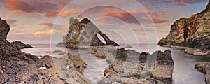 Bow Fiddle Rock on the Moray coast, Scotland at sunset