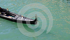 Bow of a gondola the iconic tourist boat sailing the Grand Canal in Venice Italy